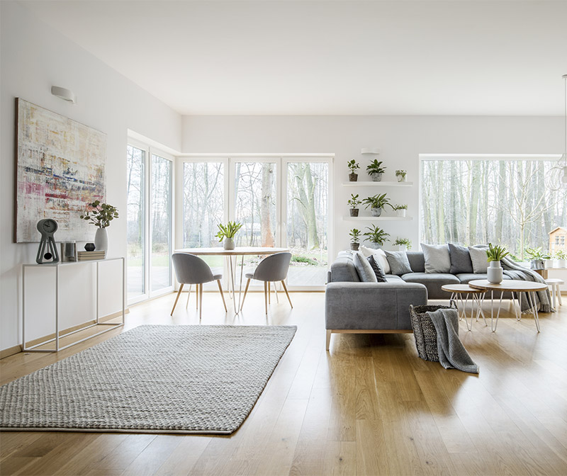 Modern new build home sitting room for underfloor heating connected to air-to-water heat pump or ground-source heat pump